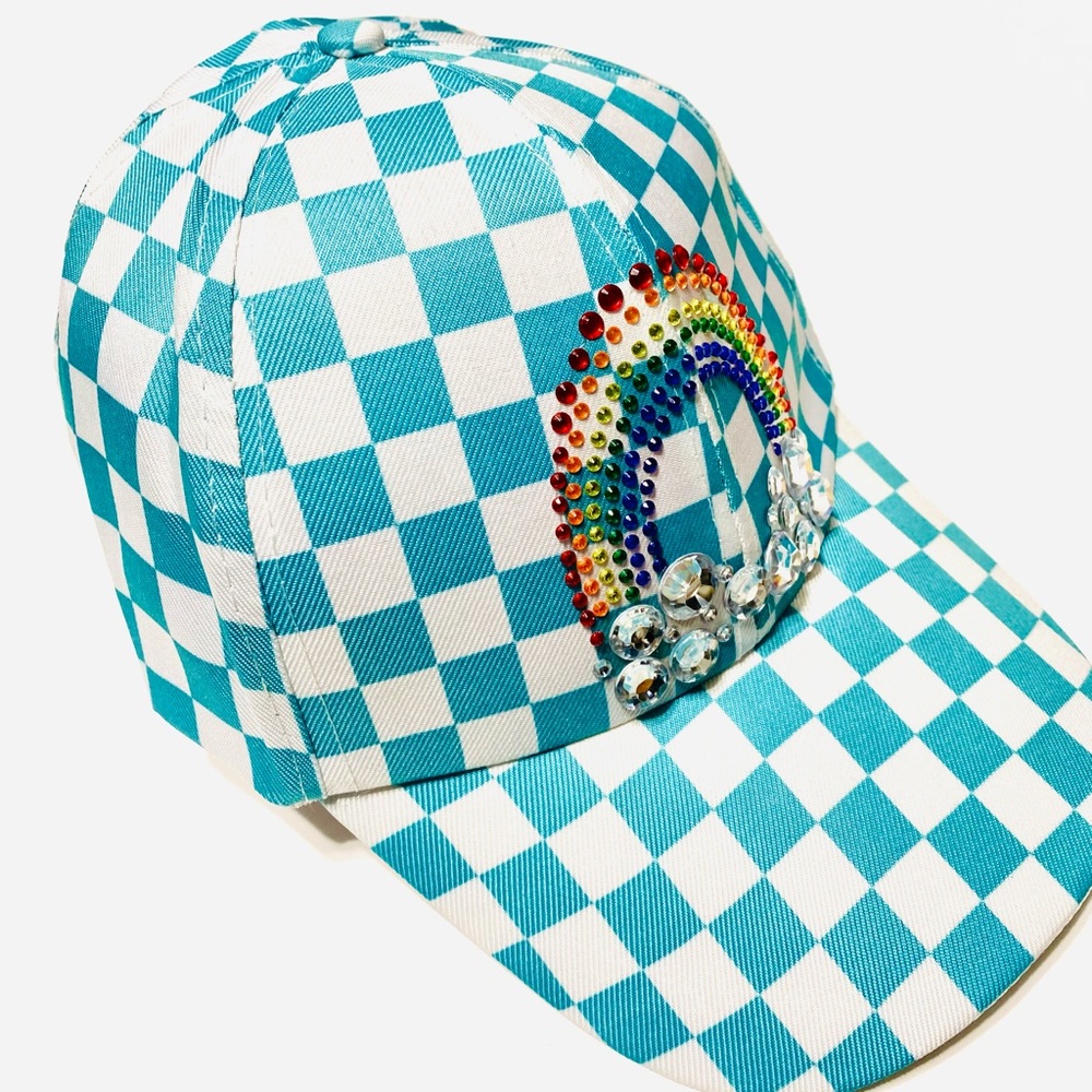 Sparkling Violet’s custom teal and white design and full brim casual hat.